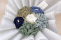 Top view of a hijab bouquet with colorful hijabs