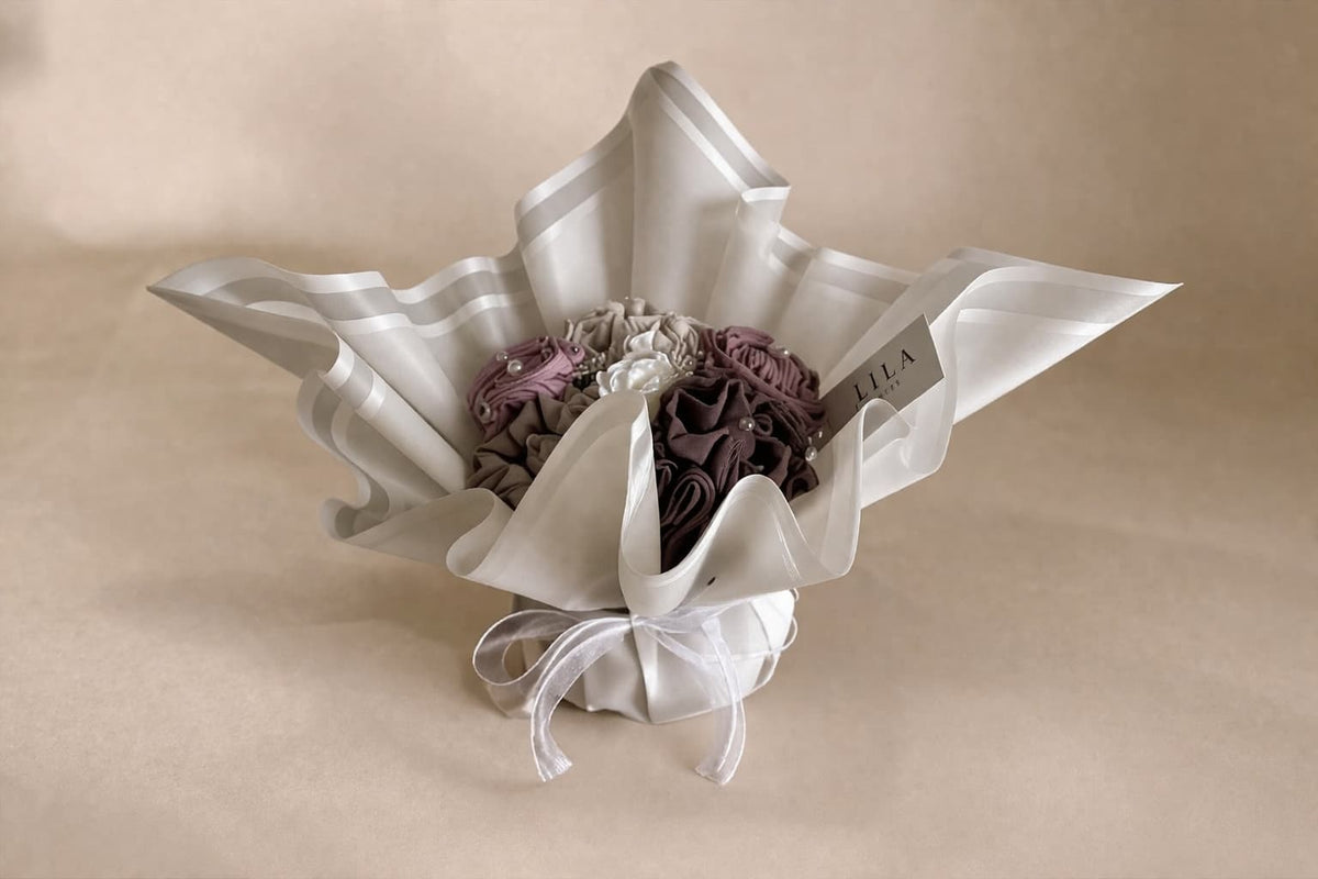 Hijab bouquet with folded hijabs as a gift for a Muslim woman